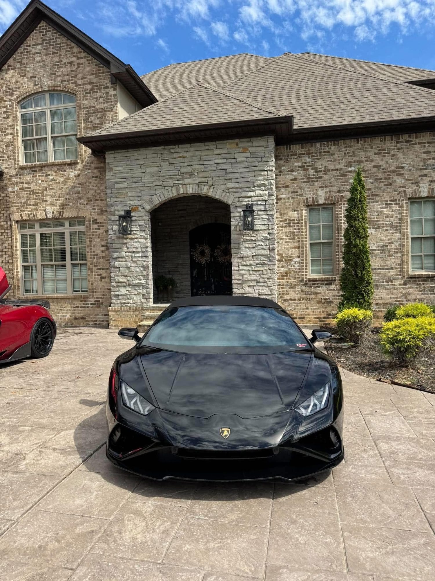 Black Lamborghini Huracán front end after an exterior detail