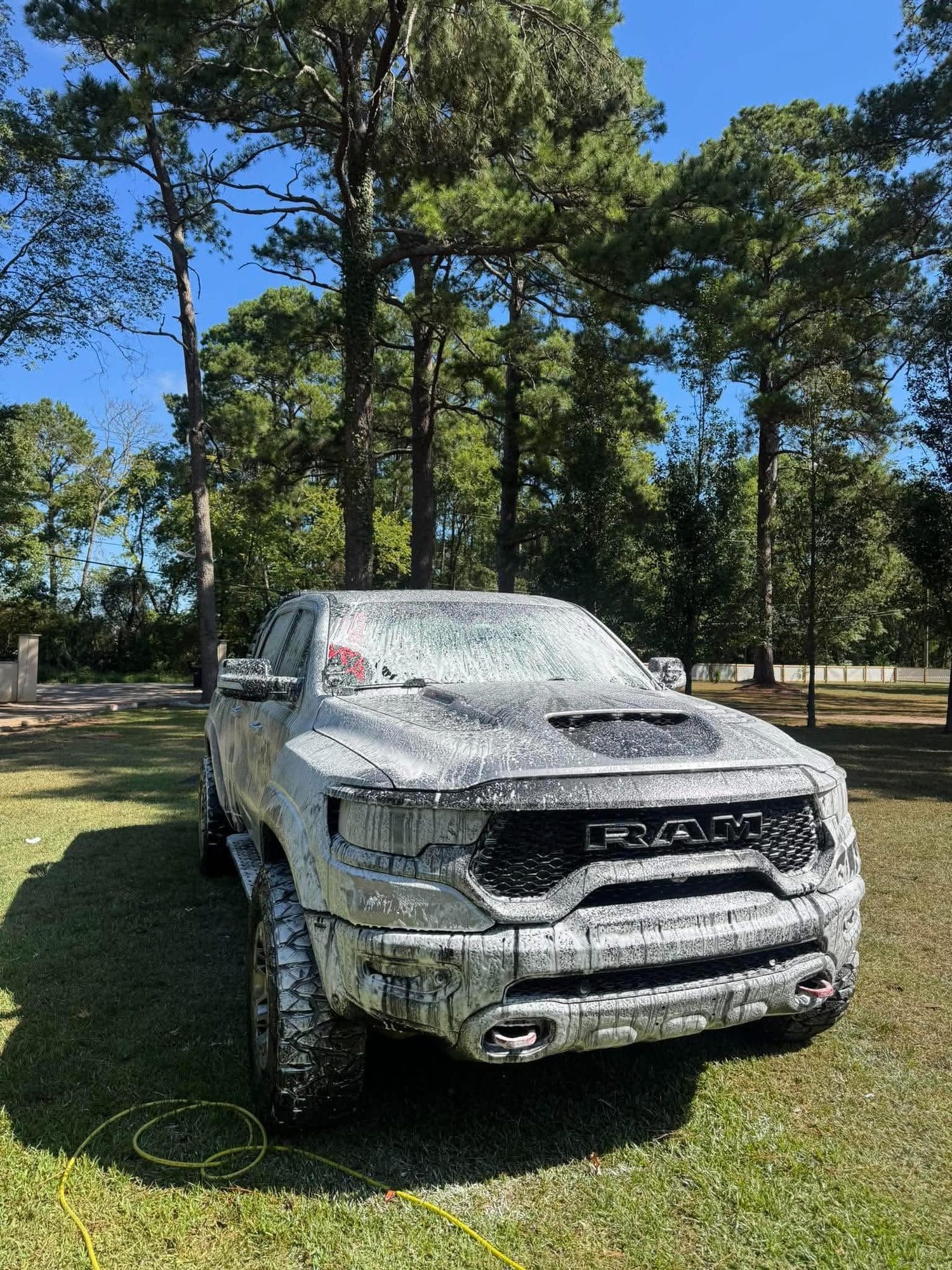 Ram truck covered in foam during an exterior wash